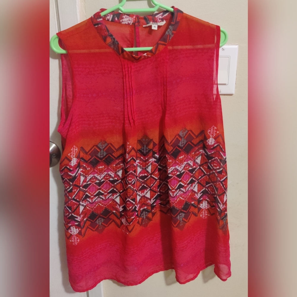 AND red blouse with cool traingle pattern
